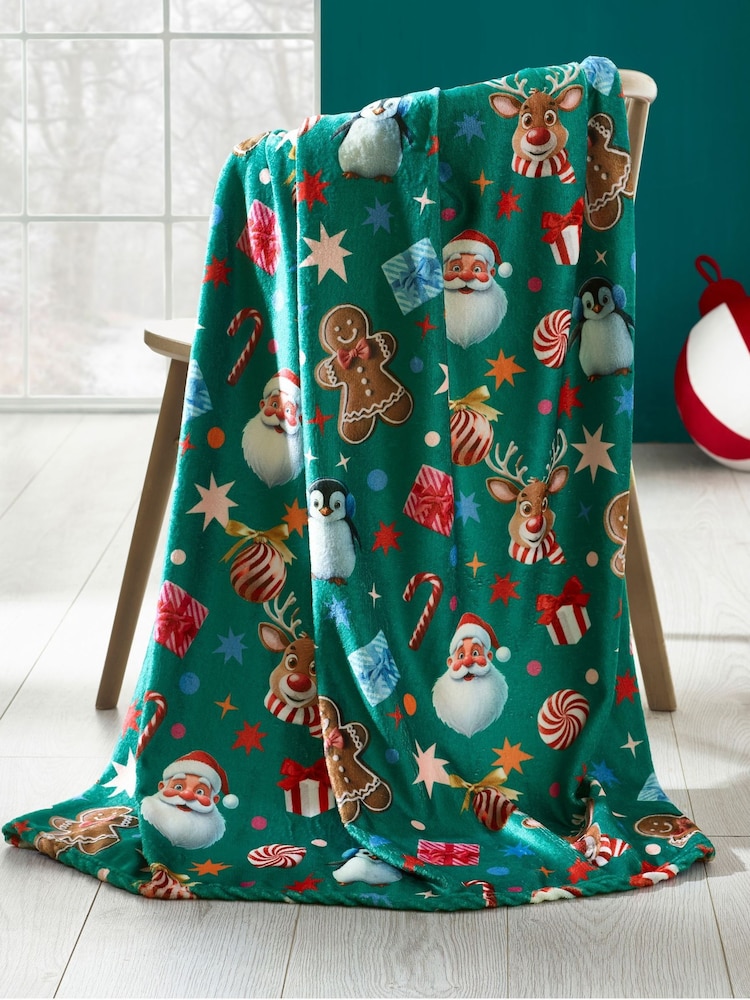 Catherine Lansfield Green Christmas Icons Cosy Fleece Blanket Throw - Image 1 of 3 Catherine Lansfield Green Christmas Icons Cosy Fleece Blanket Throw - Image 1 of 3