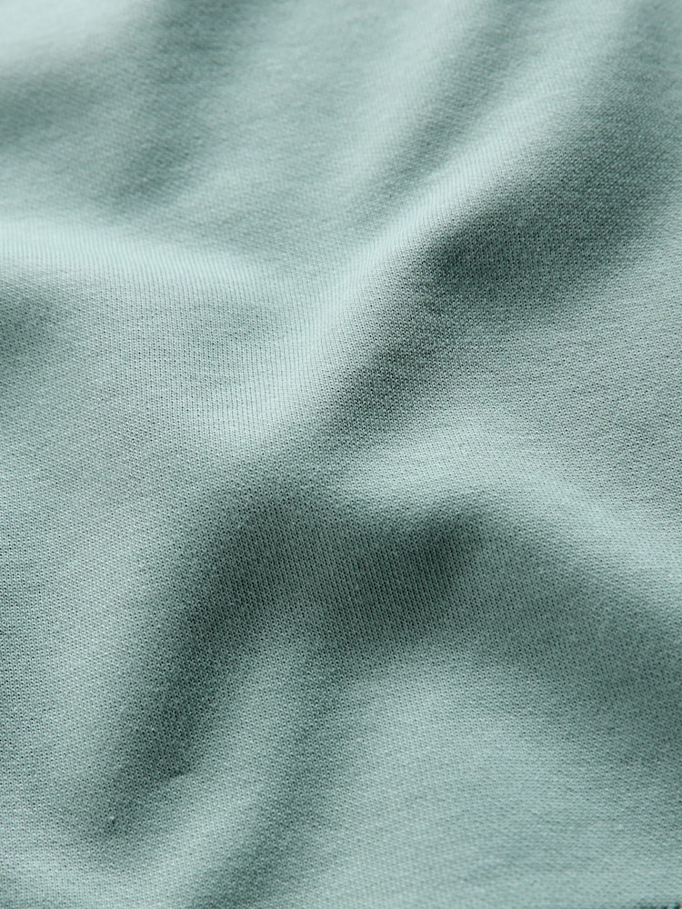 The Set Interlock Cropped Short Sleeve T-Shirt and Wide Leg Joggers Set Teal Blue - Image 5 of 5 The Set Interlock Cropped Short Sleeve T-Shirt and Wide Leg Joggers Set Teal Blue - Image 5 of 5