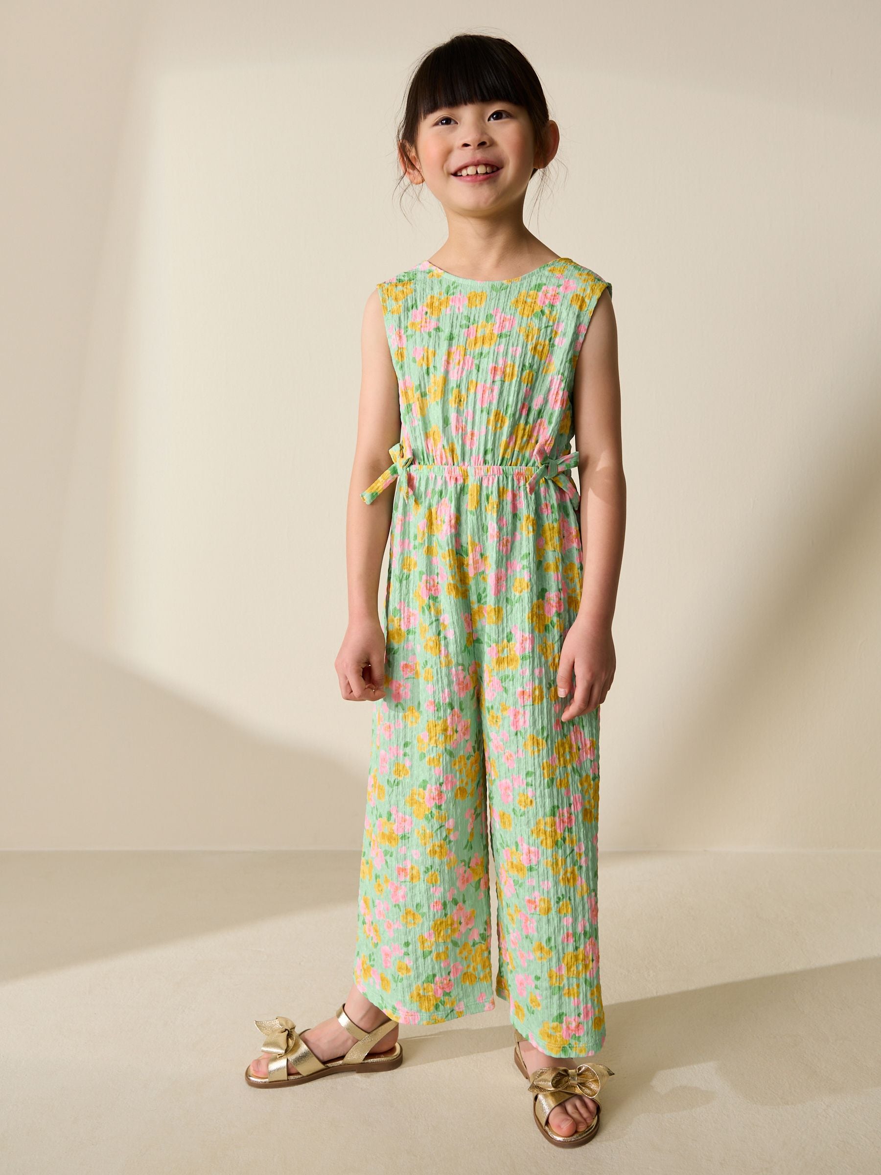 apolina／jump suits／3-5y Buy Green Ditsy Crinkle Jersey Jumpsuit (3-16yrs) from the Next UK
