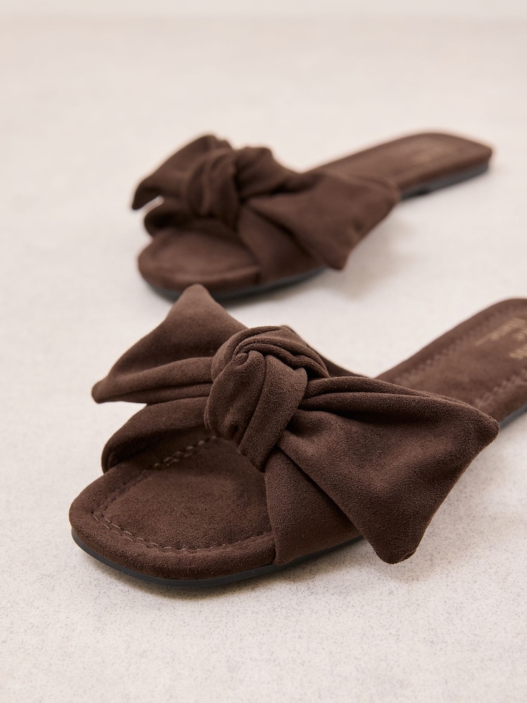 Friends Like These Chocolate Brown Faux Suede Bow Slip On Flat Summer Slider Sandals - Image 2 of 4