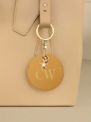 Jonnys Sister	Personalised Faux Leather Bag Accessory with Gold Tone Starfish Charm - Image 1 of 1