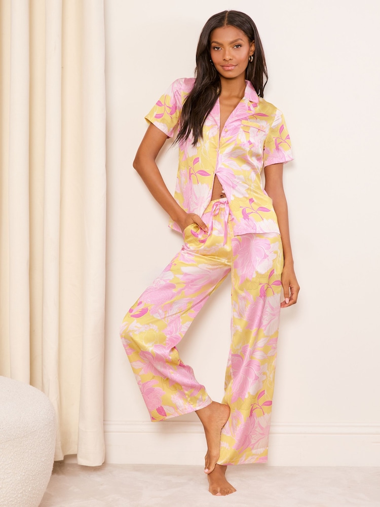 Lipsy Pink/Yellow Petite Satin Short Sleeve and Long Trousers Pyjamas Set - Image 1 of 4 Lipsy Pink/Yellow Petite Satin Short Sleeve and Long Trousers Pyjamas Set - Image 1 of 4