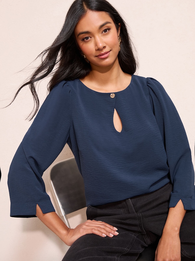 Friends Like These Navy 3/4 Sleeve Keyhole Front Hardware Detail Blouse - Image 1 of 4 Friends Like These Navy 3/4 Sleeve Keyhole Front Hardware Detail Blouse - Image 1 of 4