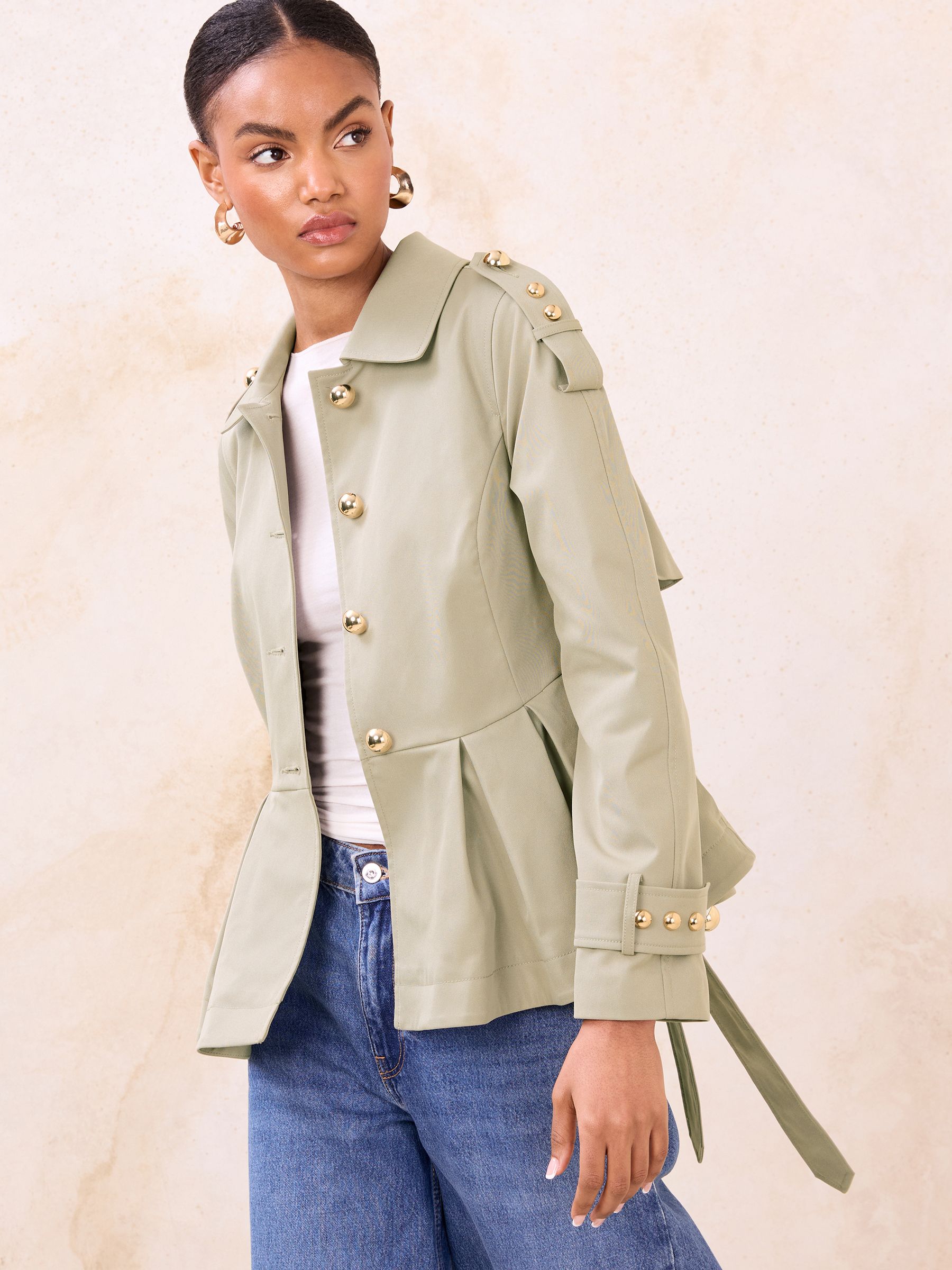 Buy Lipsy Olive Green Pleated Peplum Hem Trench Coat from Next USA