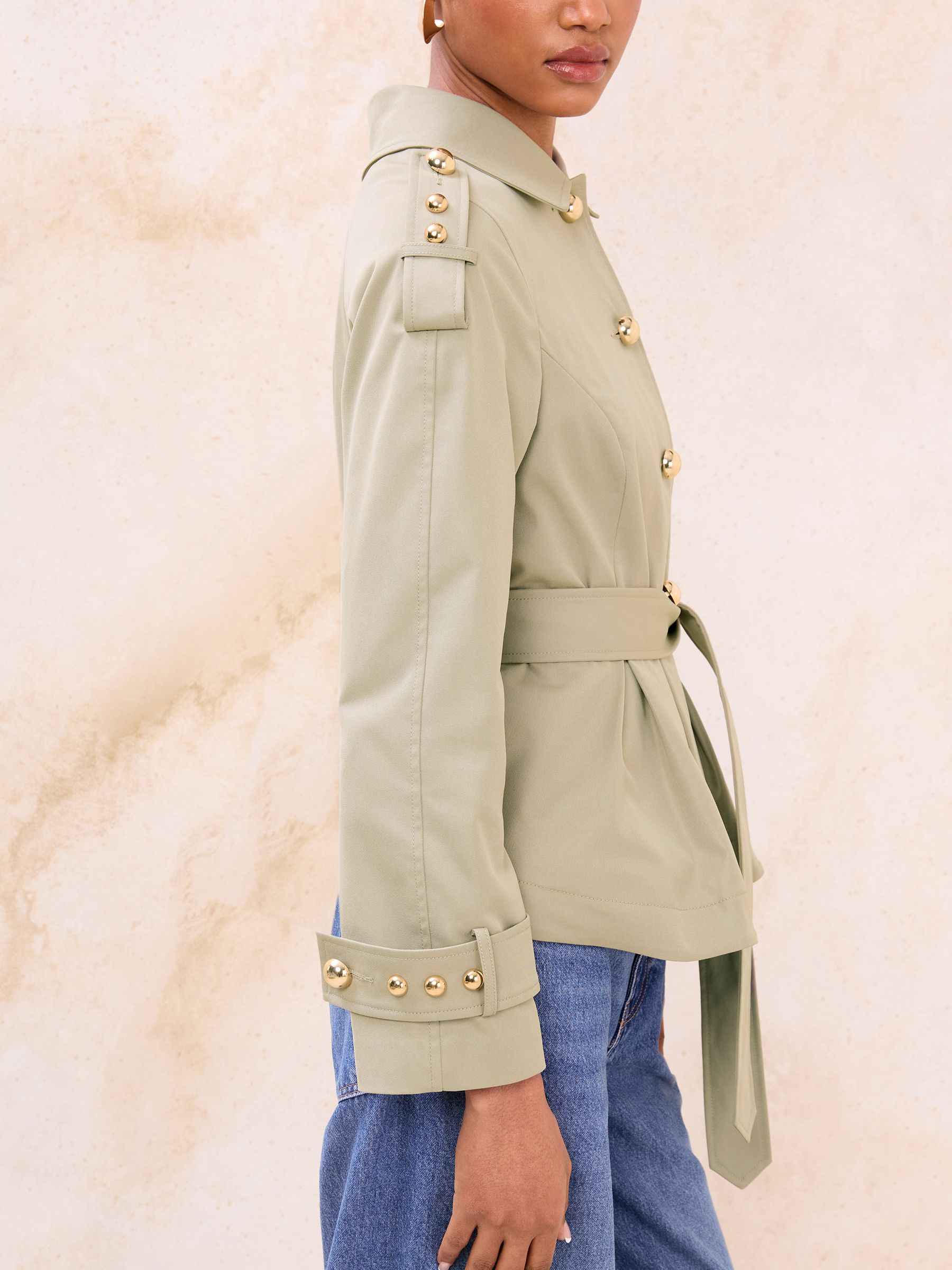 Buy Lipsy Olive Green Pleated Peplum Hem Trench Coat from Next USA