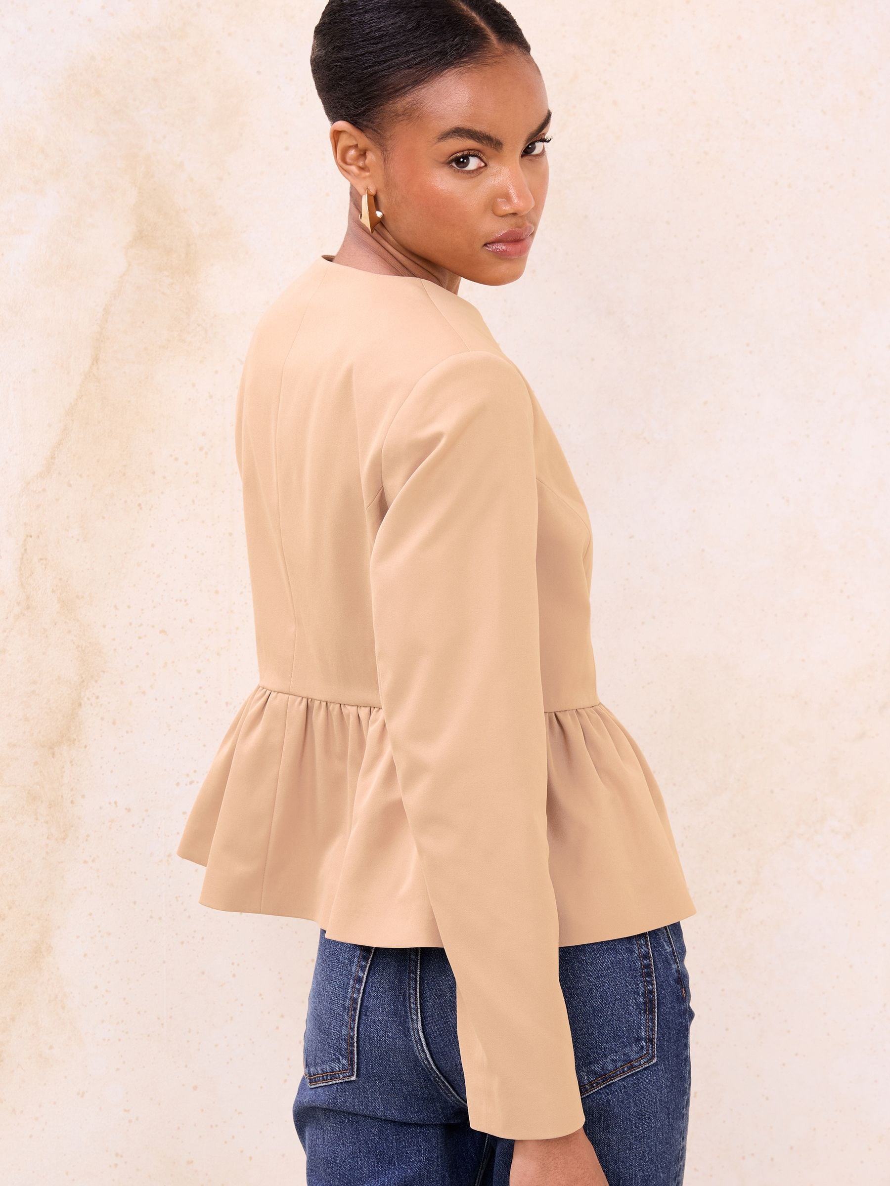 Buy Lipsy Camel Brown Collarless Peplum Hem Jacket from the Next