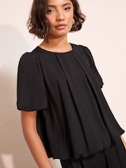 Friends Like These Black Short Sleeve Bubble Hem Pleated Blouse - Image 1 of 4