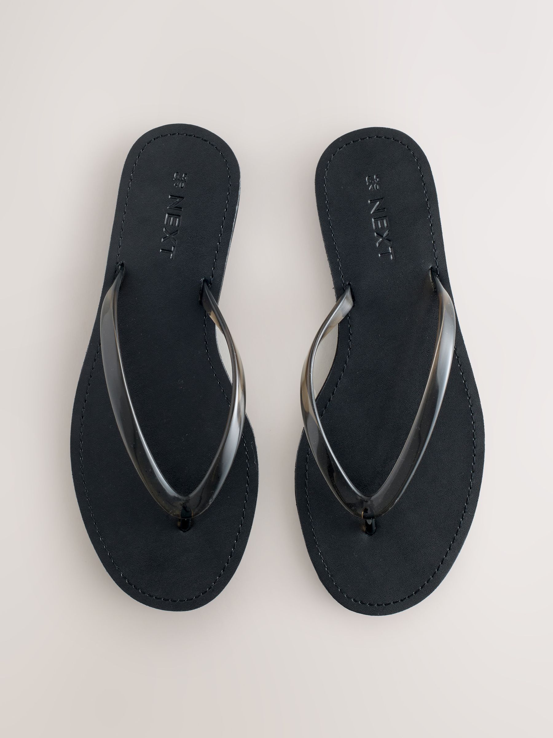Buy Black Jelly Toe Thong Sandals from Next USA