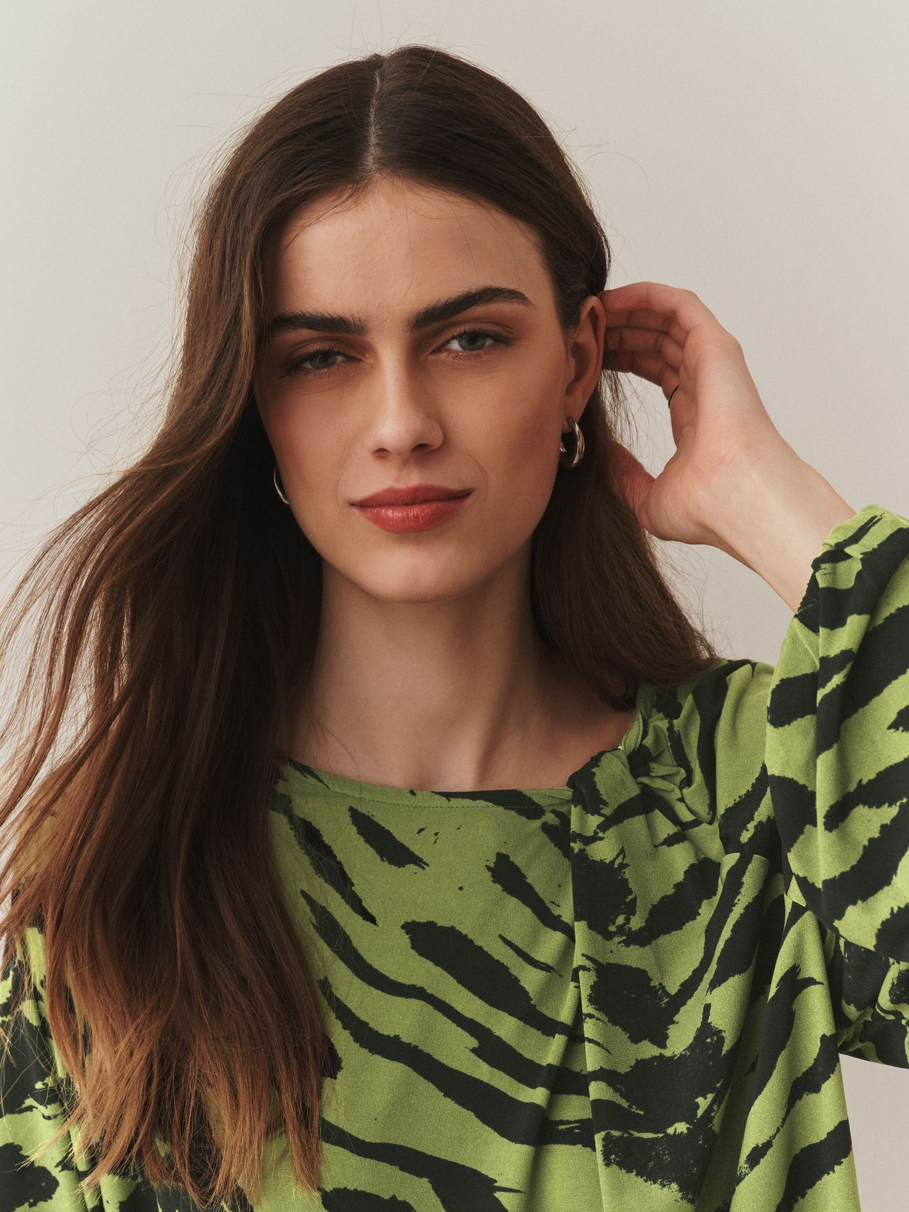 Buy Green Animal Print Twist Neck Long Sleeve Blouse from Next Ireland