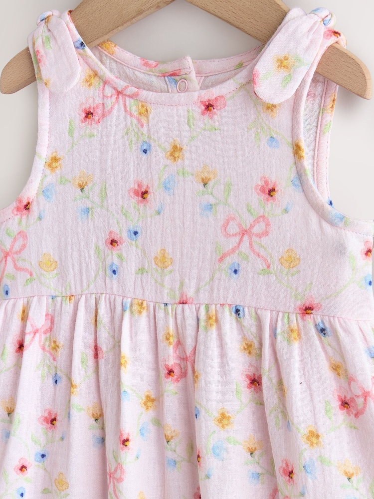 Roz floral - Salopetă muselină cu picioare lungi pentru bebeluși (0luni-3ani) - Imaginea 7 din 7 Roz floral - Salopetă muselină cu picioare lungi pentru bebeluși (0luni-3ani) - Imaginea 7 din 7