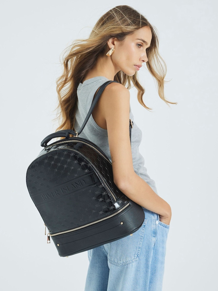 River Island Embossed Logo Backpack - صورة 1 من 6 River Island Embossed Logo Backpack - صورة 1 من 6