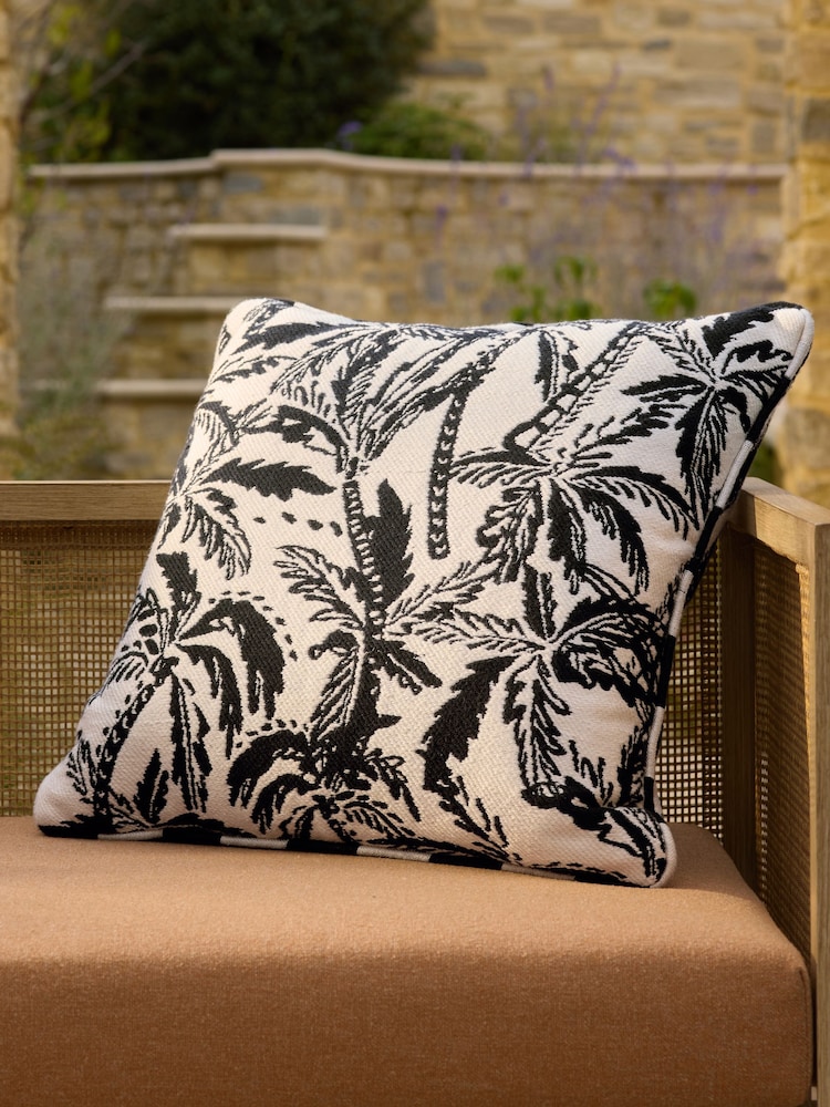 Black/White 50 x 50cm Indoor Outdoor Jacquard Palm Tree Cushion - Image 1 of 4