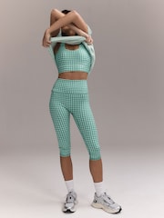 أخضر مربعات - بنطلون ضيِّق رياضي قصير من تشكيلة Active - صورة 3 من 9