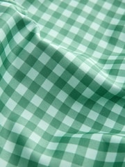 أخضر مربعات - بنطلون ضيِّق رياضي قصير من تشكيلة Active - صورة 9 من 9