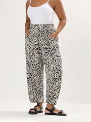 Yours Curve Black Abstract Print Trousers - Image 1 of 5