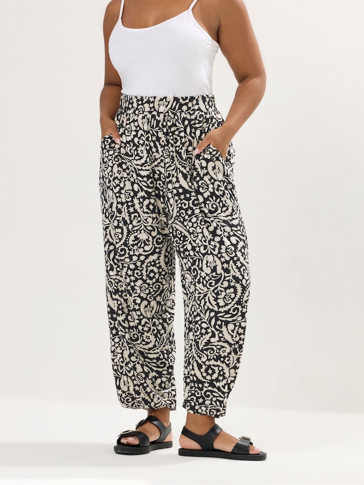 Yours Curve Black Abstract Print Trousers - Image 1 of 5