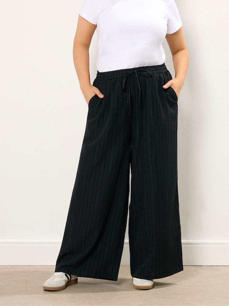 Yours Curve Black Crinkle Wide Leg Trousers - Image 1 of 5