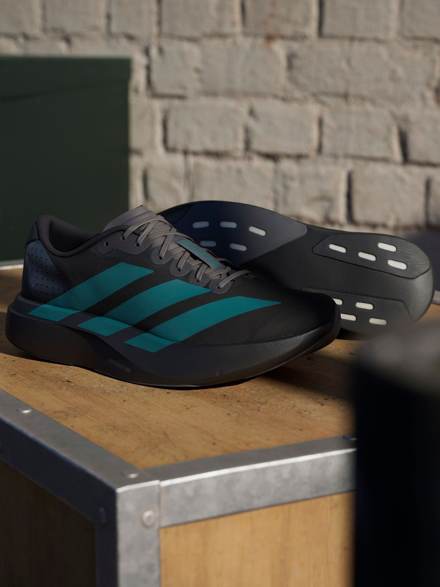 Buy adidas Black/Green Adizero EVO SL Trainers from Next USA