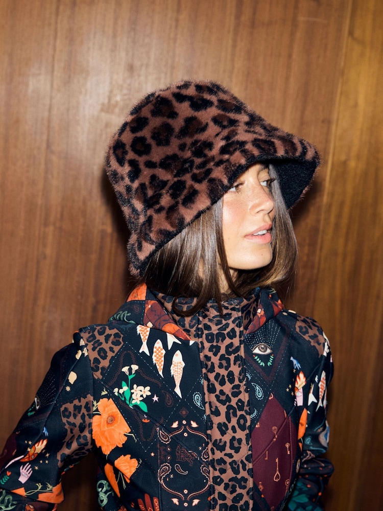 Never Fully Dressed Leopard Reversible Borg/Fur Bucket Hat - Image 1 of 5 Never Fully Dressed Leopard Reversible Borg/Fur Bucket Hat - Image 1 of 5