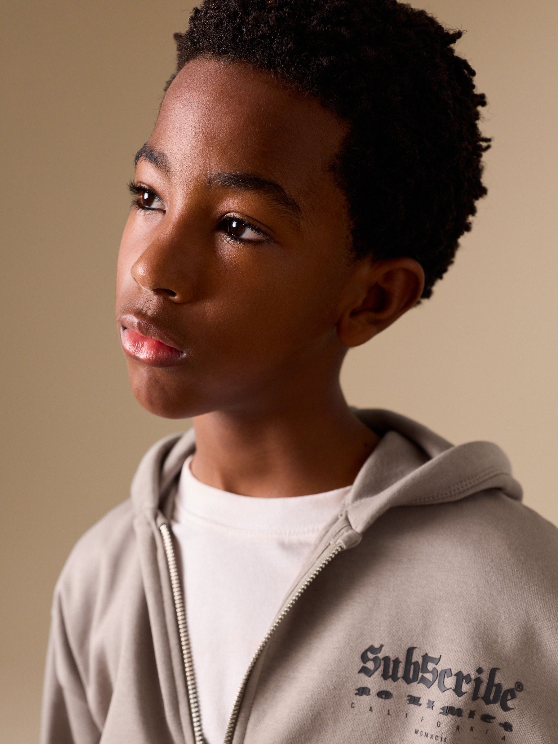 トップス Stone  Design Zip Hoodie Buy Stone Subscribe Graphic Zip Through Hoodie (3-16yrs) from Next USA