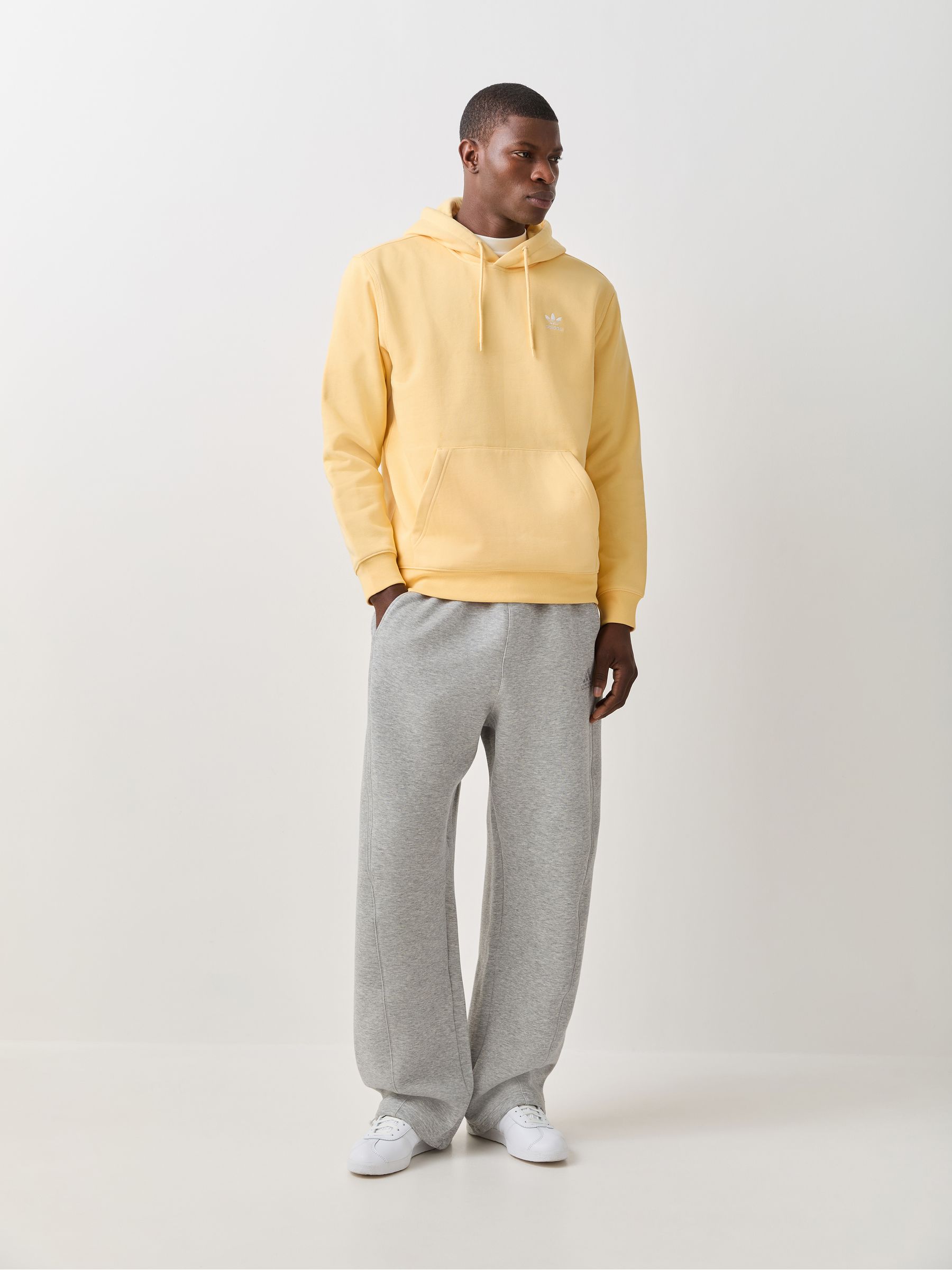 Buy adidas Originals Yellow Trefoil Essentials Loose Hoodie from