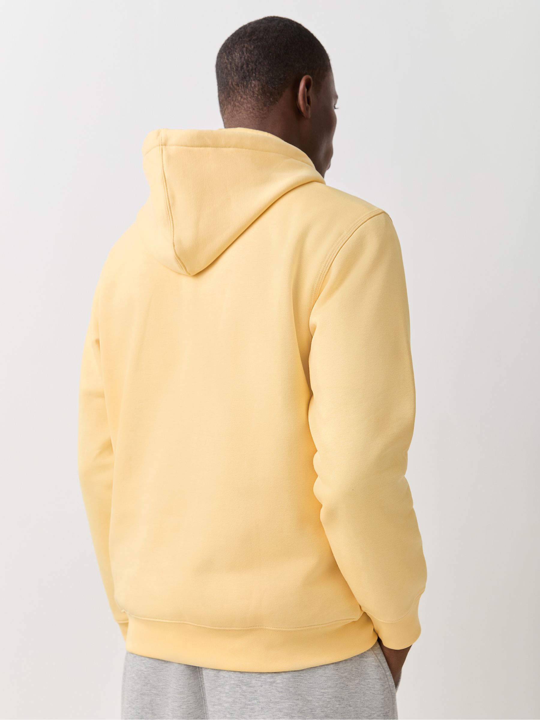 Buy adidas Originals Yellow Trefoil Essentials Loose Hoodie from