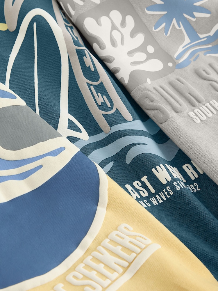 أصفر/رمادي/أزرق على أخضر - حزمة من 3 قطع تيشرت بكُم قصير بتلبيس مريح مزيَّن بطبعة جرافيك (3-16سنوات) - صورة 7 من 7 أصفر/رمادي/أزرق على أخضر - حزمة من 3 قطع تيشرت بكُم قصير بتلبيس مريح مزيَّن بطبعة جرافيك (3-16سنوات) - صورة 7 من 7