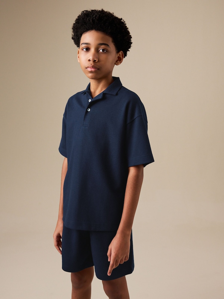 Navy Short Sleeve Textured Polo Shirt and Shorts Set (3-16yrs) - Image 1 of 9