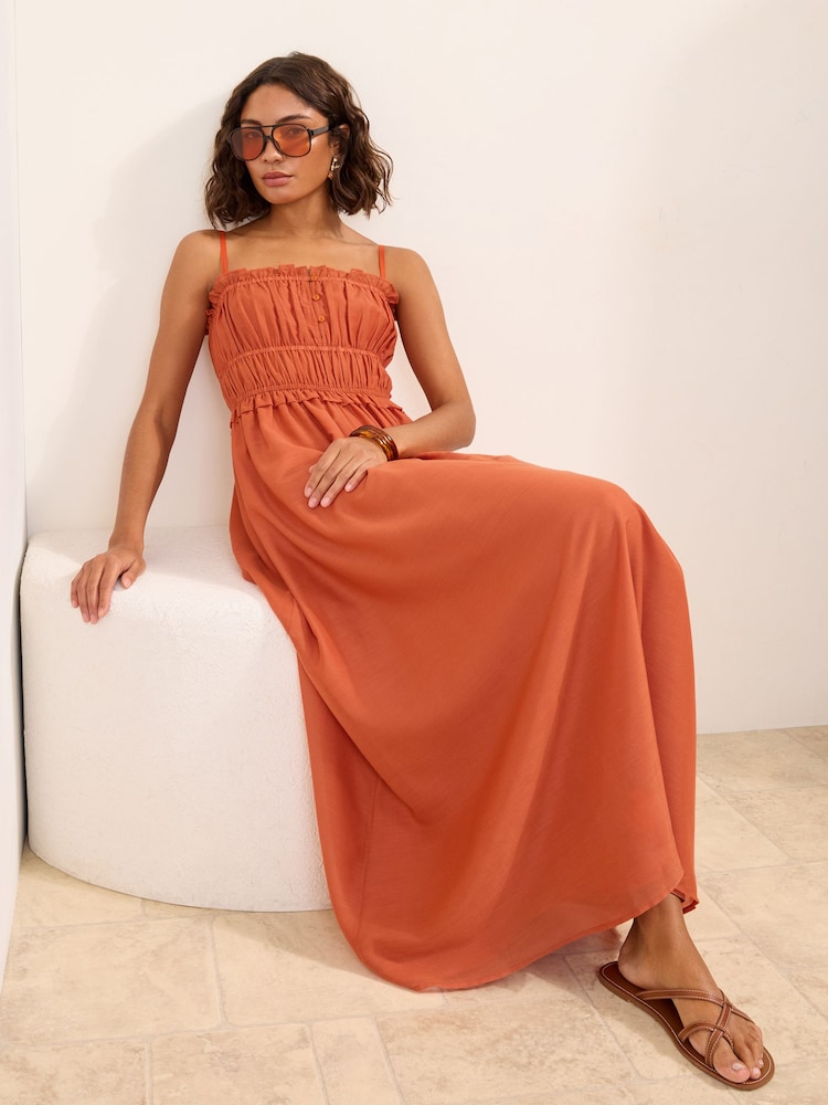 Friends Like These Amber Orange Strappy Shirred Waist Button Detail Sheer Midi Dress - Image 1 of 6 Friends Like These Amber Orange Strappy Shirred Waist Button Detail Sheer Midi Dress - Image 1 of 6