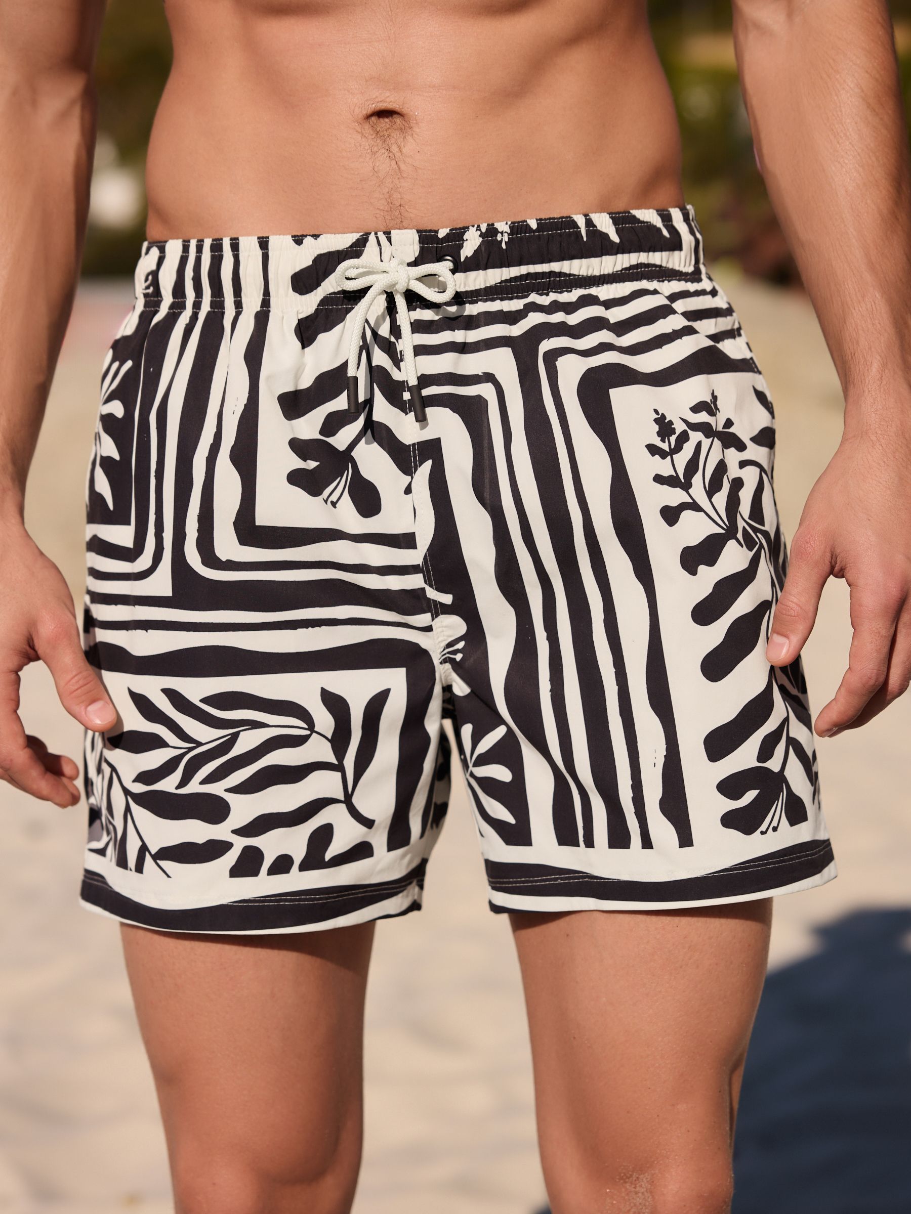 Buy Mono Tile Print 5 Inch Swim Shorts from Next Japan