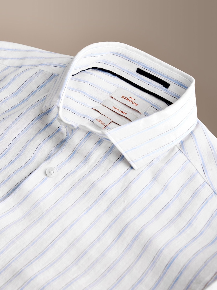 أبيض/أزرق مقلم - قميص أنيق كُم طويل كتان من تشكيلة Signature - صورة 9 من 9 أبيض/أزرق مقلم - قميص أنيق كُم طويل كتان من تشكيلة Signature - صورة 9 من 9