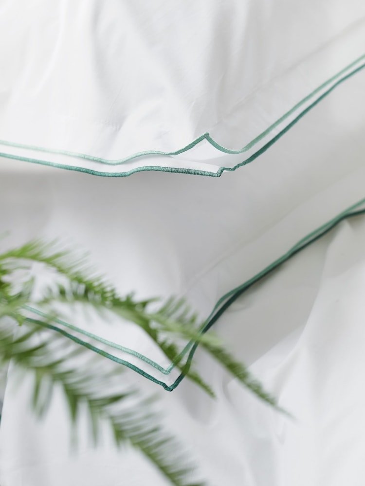 Designers Guild Porcelain Green Astor 400 Thread Count Duvet Cover and Pillowcase Set - Image 2 of 4 Designers Guild Porcelain Green Astor 400 Thread Count Duvet Cover and Pillowcase Set - Image 2 of 4