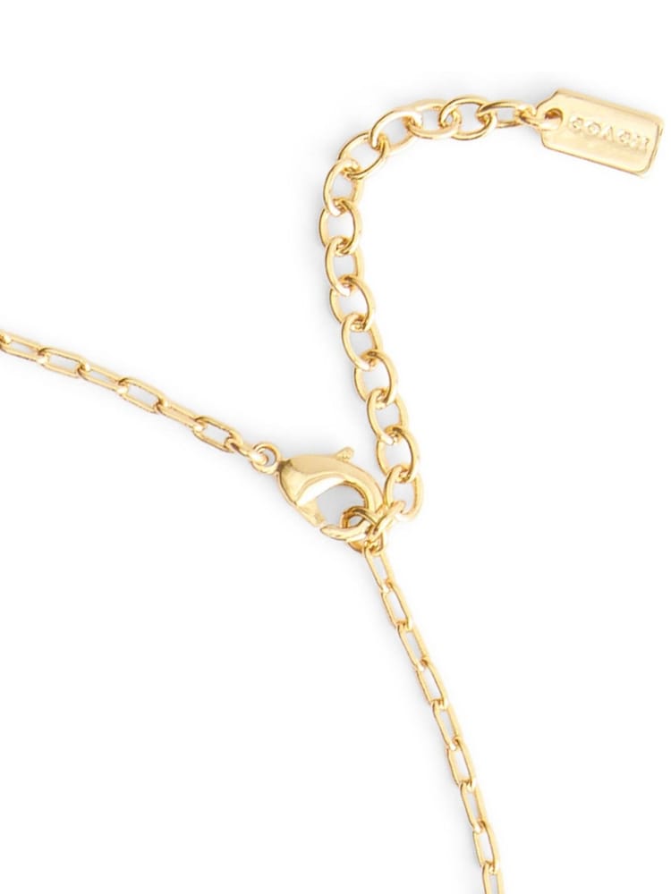 COACH Gold Signature Rexy Pendant Necklace - Image 4 of 4 COACH Gold Signature Rexy Pendant Necklace - Image 4 of 4