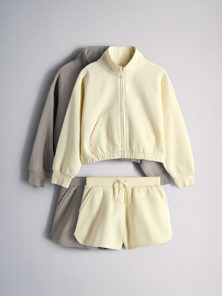 The Set 2 Pack Jersey Funnel Neck Zip Through Cropped Jacket and Shorts Yellow/Brown - Image 1 of 6
