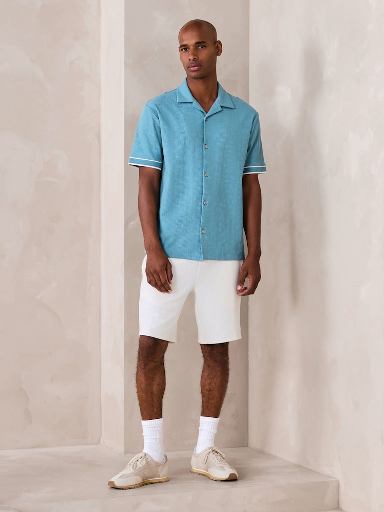 أزرق على أخضر أزرق - قميص جيرسيه بملمس بارز بكُم قصير وحواف متباينة - صورة 2 من 4 أزرق على أخضر أزرق - قميص جيرسيه بملمس بارز بكُم قصير وحواف متباينة - صورة 2 من 4