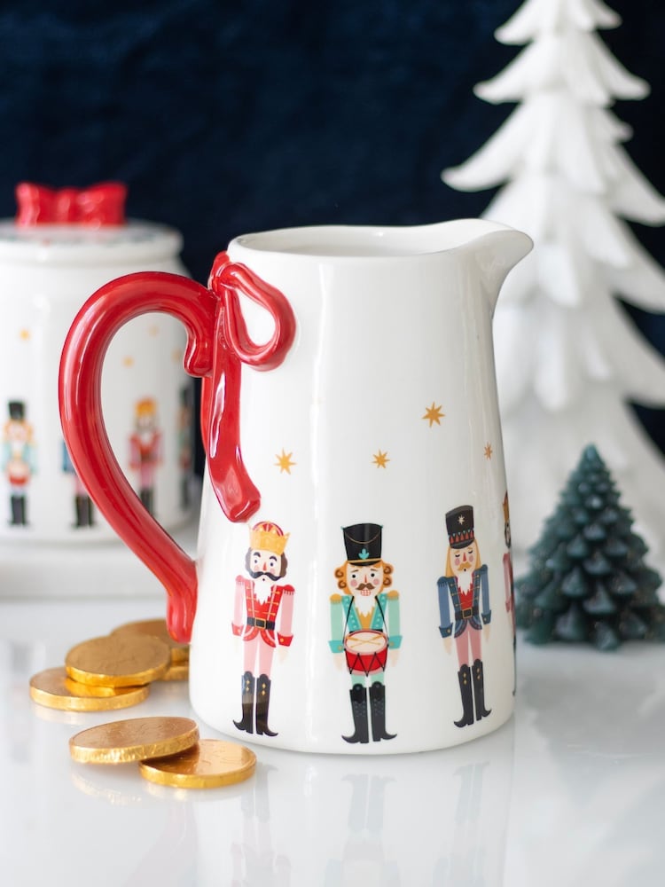 Something Different White Nutcracker Ceramic Flower Jug with Bow - Image 1 of 4 Something Different White Nutcracker Ceramic Flower Jug with Bow - Image 1 of 4