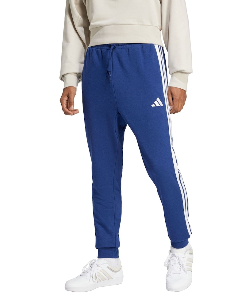 adidas Blue Essential 3-Stripes French Terry Joggers - Image 1 of 5 adidas Blue Essential 3-Stripes French Terry Joggers - Image 1 of 5