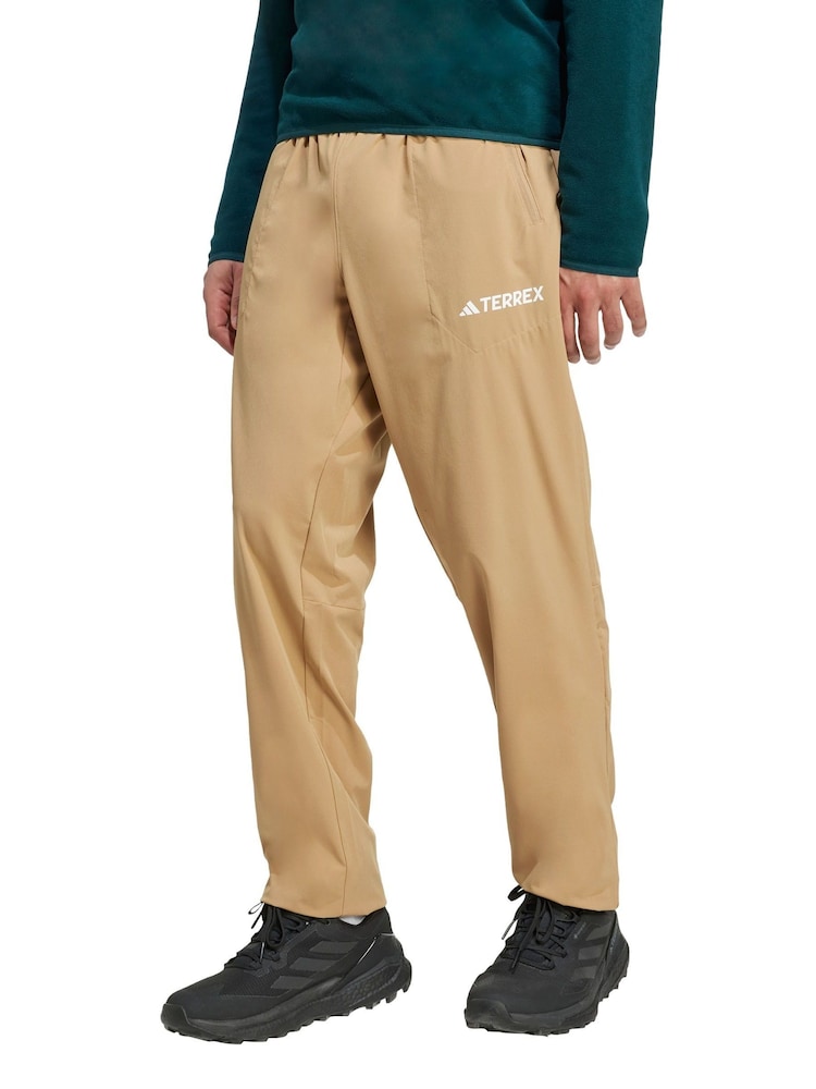 adidas Terrex Brown Multi Essentials Stretch Joggers - Image 1 of 5 adidas Terrex Brown Multi Essentials Stretch Joggers - Image 1 of 5
