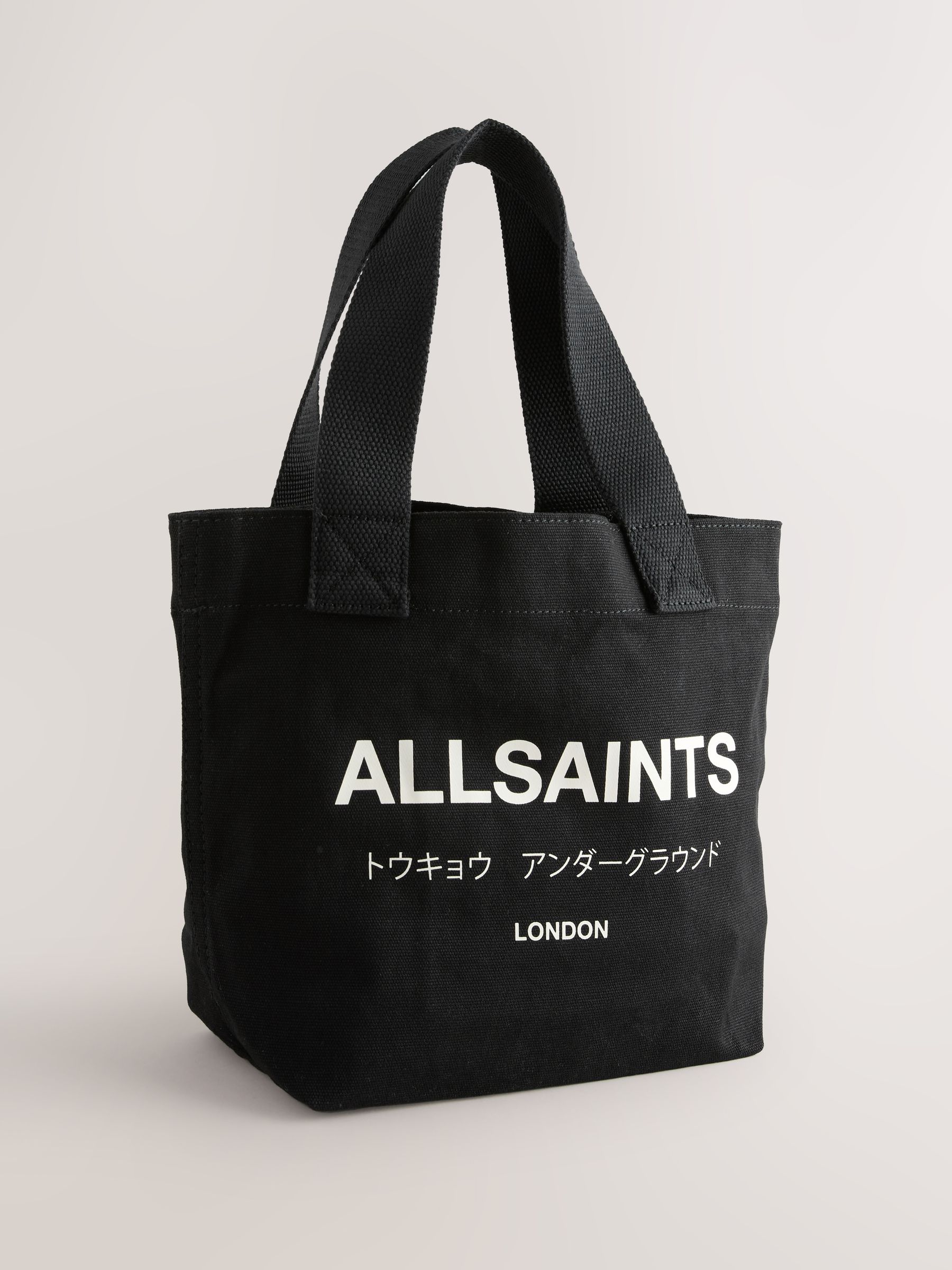 バッグ ASSEMBLE LOGO CANVAS TOTE BAG / BLACK Buy smALLSAINTS Black Underground Logo Canvas Tote Bag from Next USA