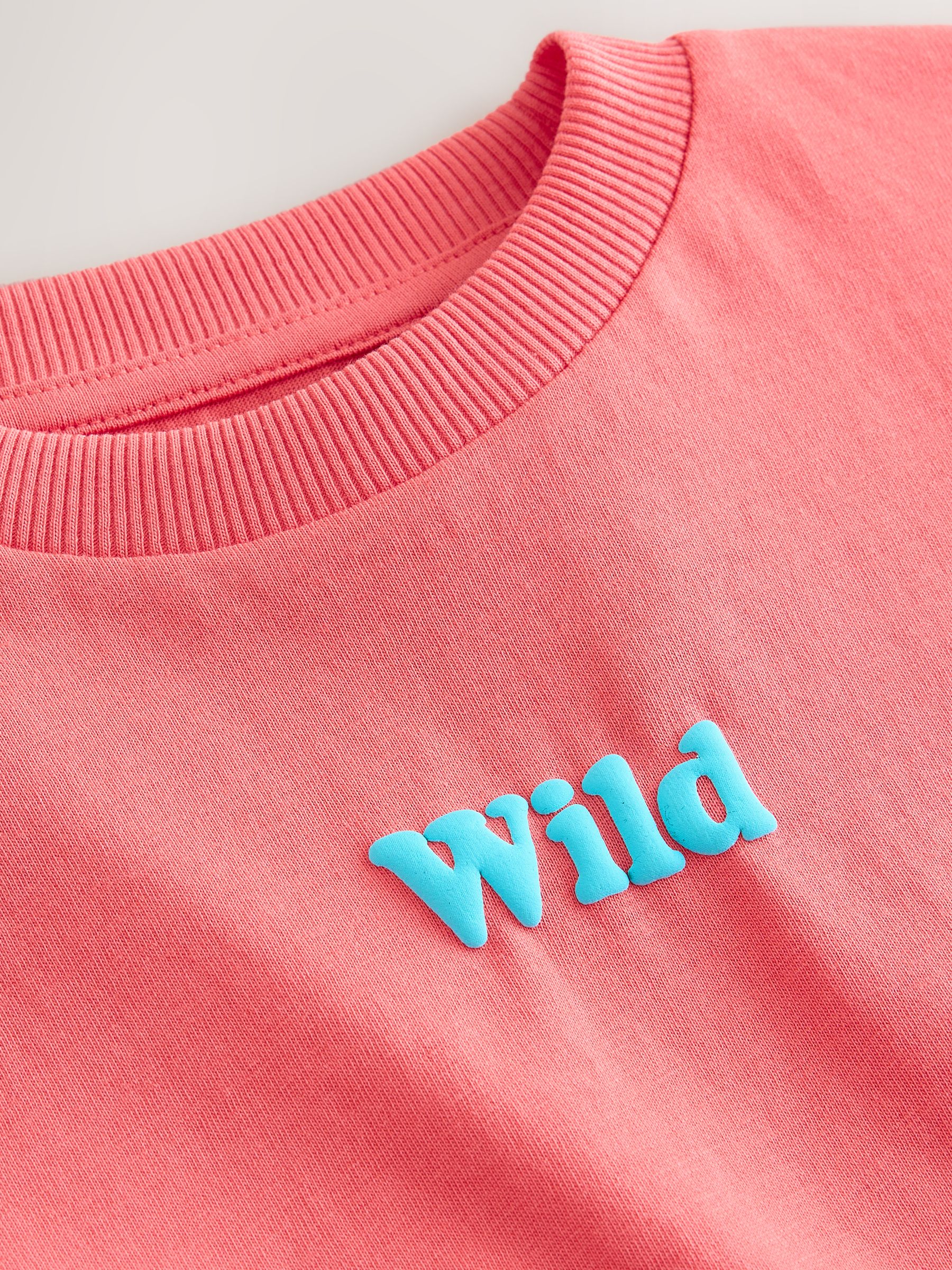 Buy Coral Pink Wild Slogan Short Sleeve Small Graphic T-Shirt