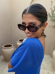 Never Fully Dressed Red Wiggle Arm Acetate Sunglasses with Case - Image 2 of 4