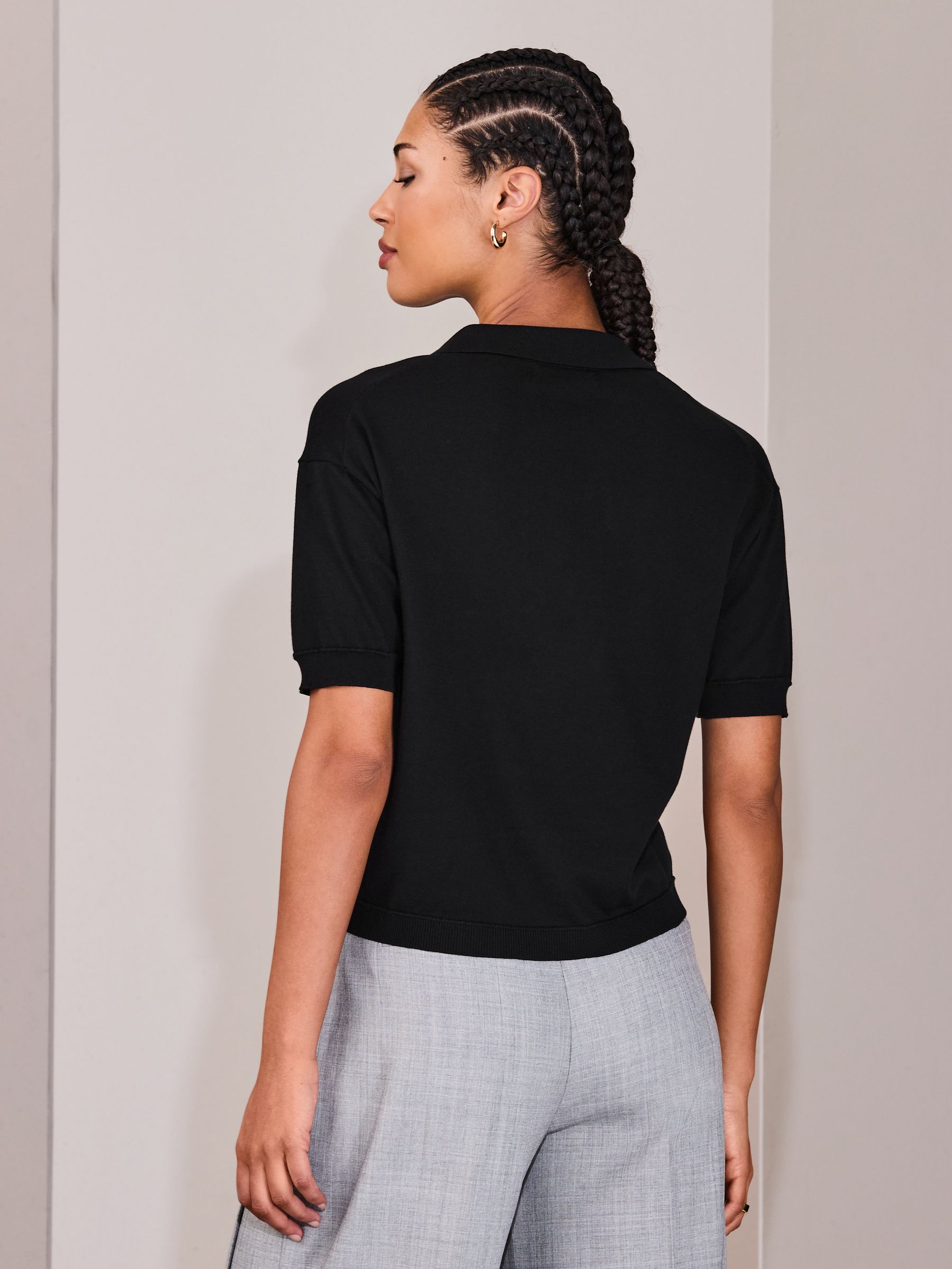 Buy Black Cotton Rich Soft Touch Knitted Polo Top from the Next UK