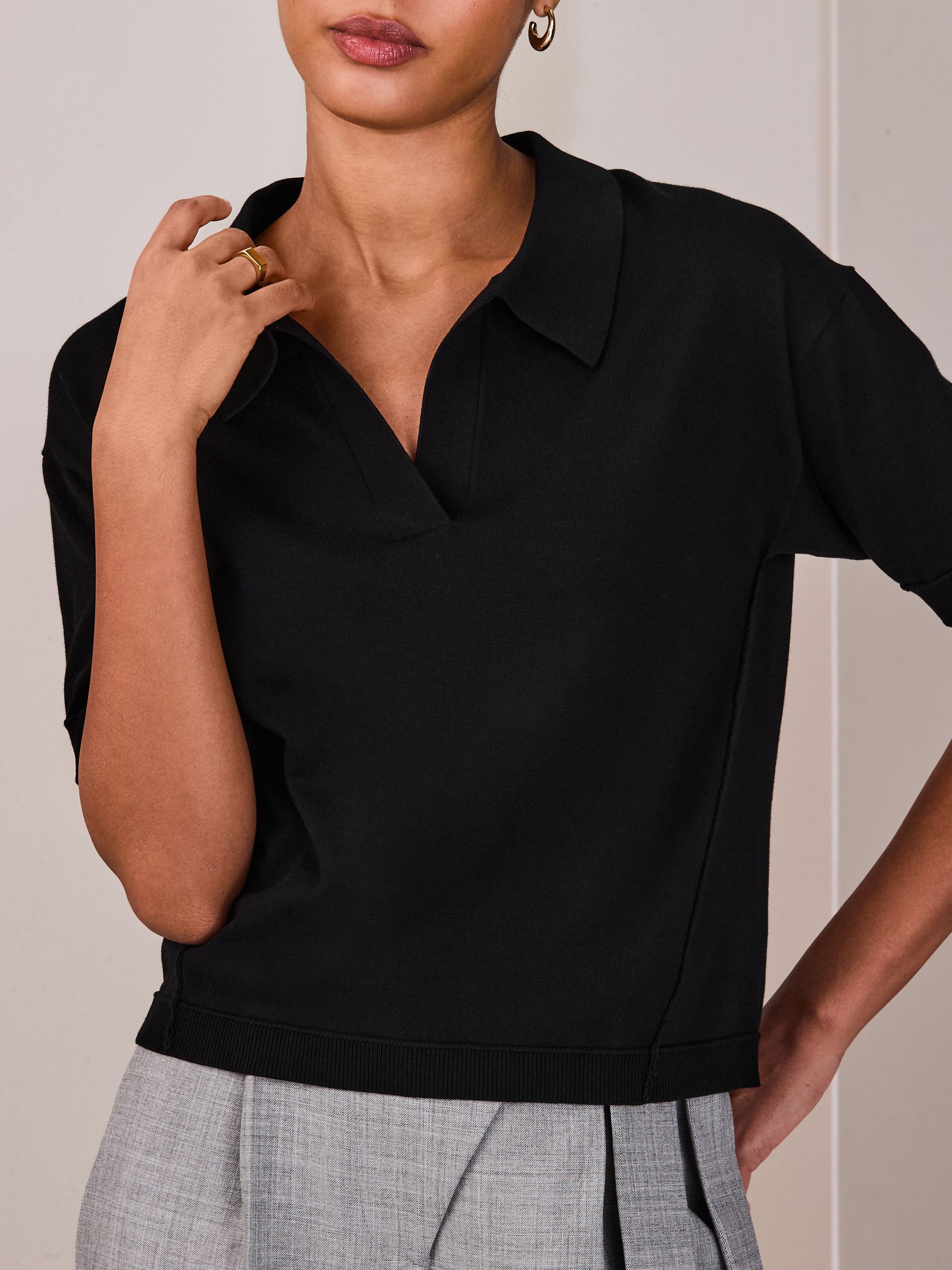Buy Black Cotton Rich Soft Touch Knitted Polo Top from the Next UK