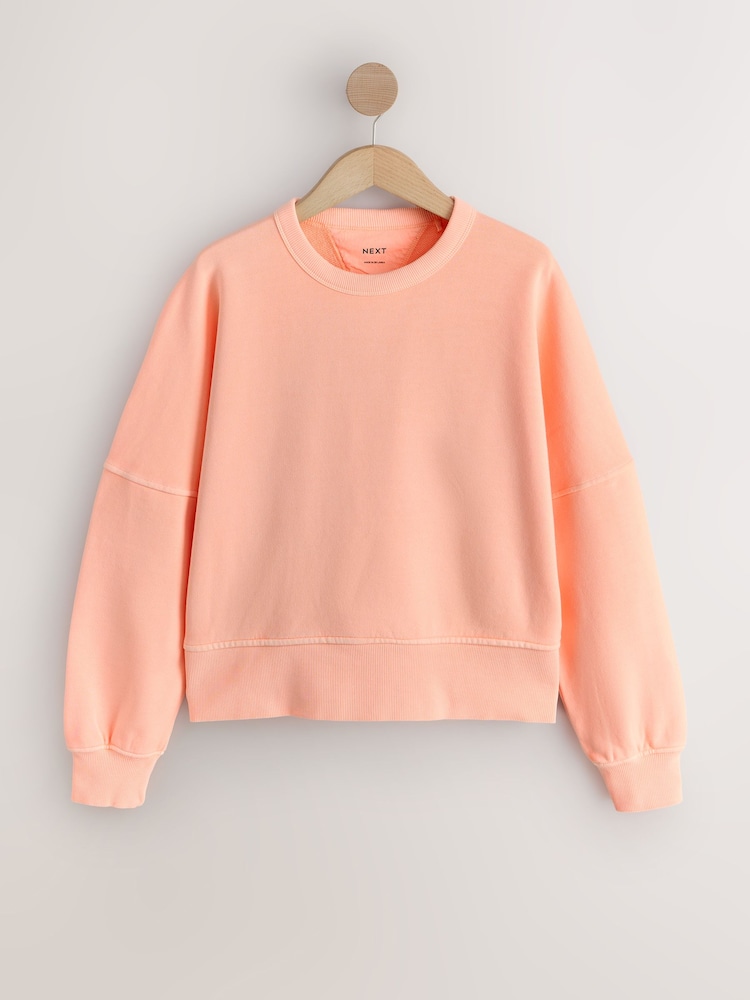 برتقالي فلوري - سويت شيرت بمظهر باهت بياقة بحافة مستديرة - صورة 1 من 3