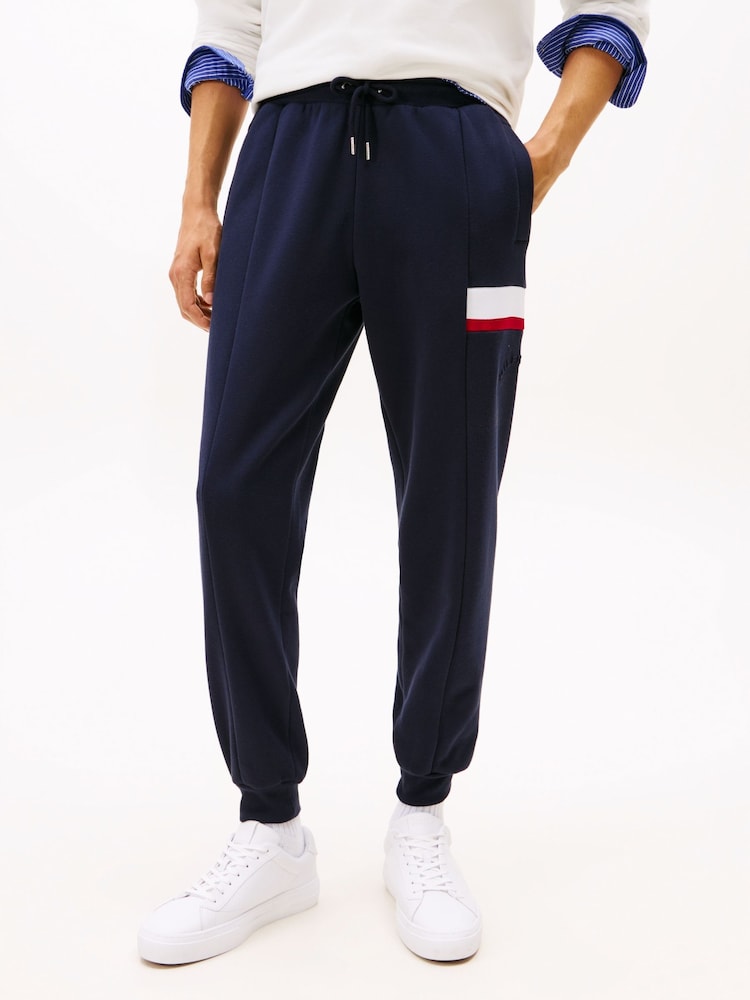 Tommy Hilfiger Blue Colour-Blocked Fleece Cuffed Joggers - Image 1 of 4 Tommy Hilfiger Blue Colour-Blocked Fleece Cuffed Joggers - Image 1 of 4
