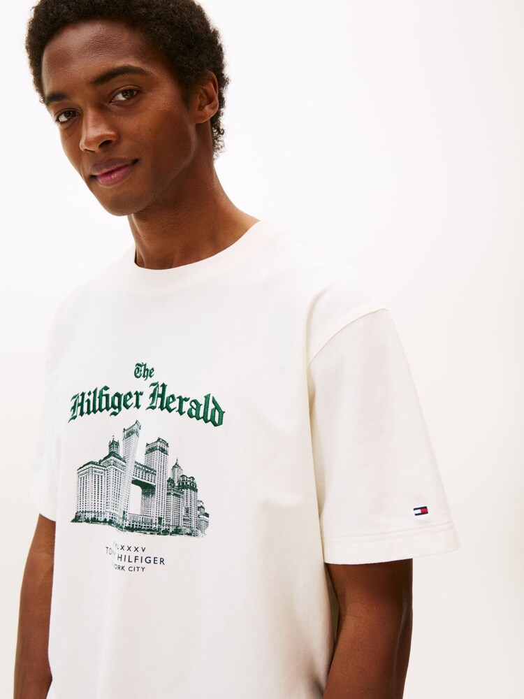 Tommy Hilfiger Cream Graphic Relaxed Crew Neck T-Shirt - Image 1 of 5 Tommy Hilfiger Cream Graphic Relaxed Crew Neck T-Shirt - Image 1 of 5