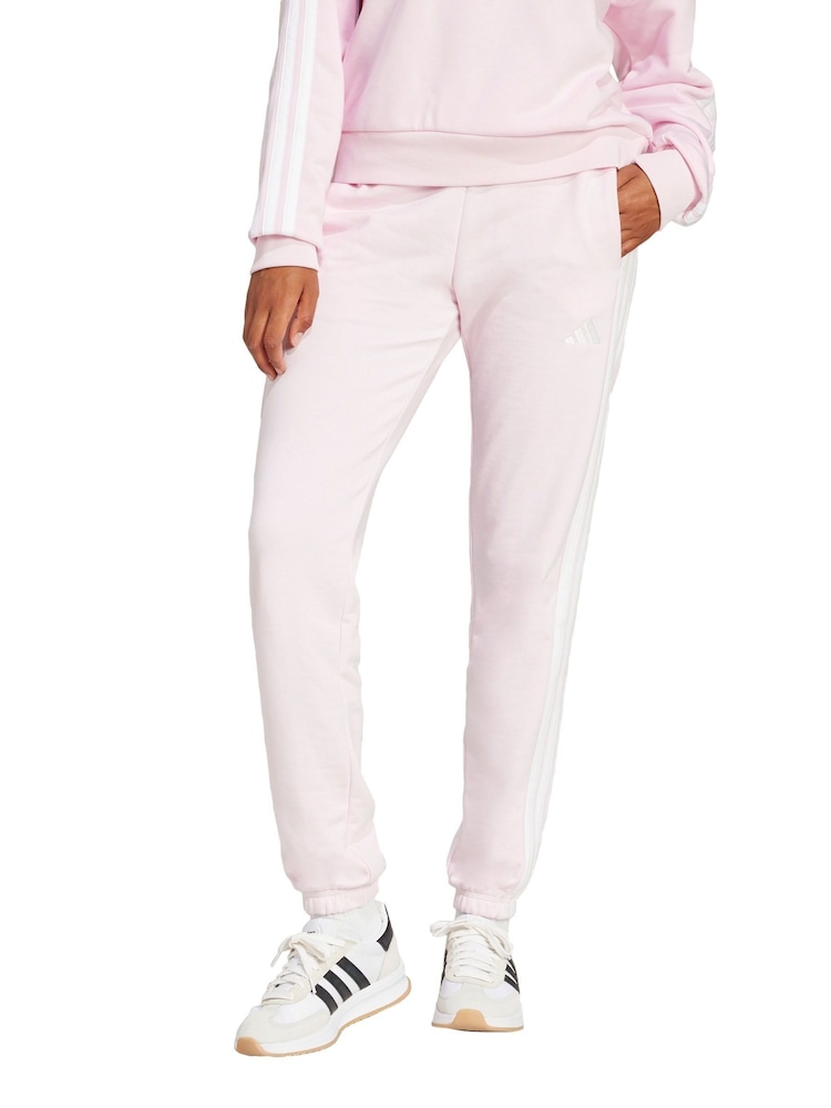 adidas Pink Essentials 3-Stripes French Terry Cuffed Joggers - Image 1 of 5 adidas Pink Essentials 3-Stripes French Terry Cuffed Joggers - Image 1 of 5