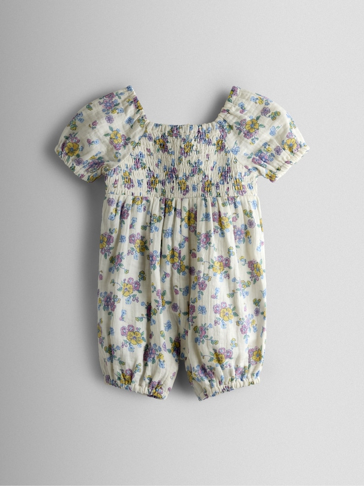 JoJo Maman Bébé Cream Floral Cheesecloth Smocked Bodice Baby Jumpsuit - Image 1 of 3 JoJo Maman Bébé Cream Floral Cheesecloth Smocked Bodice Baby Jumpsuit - Image 1 of 3