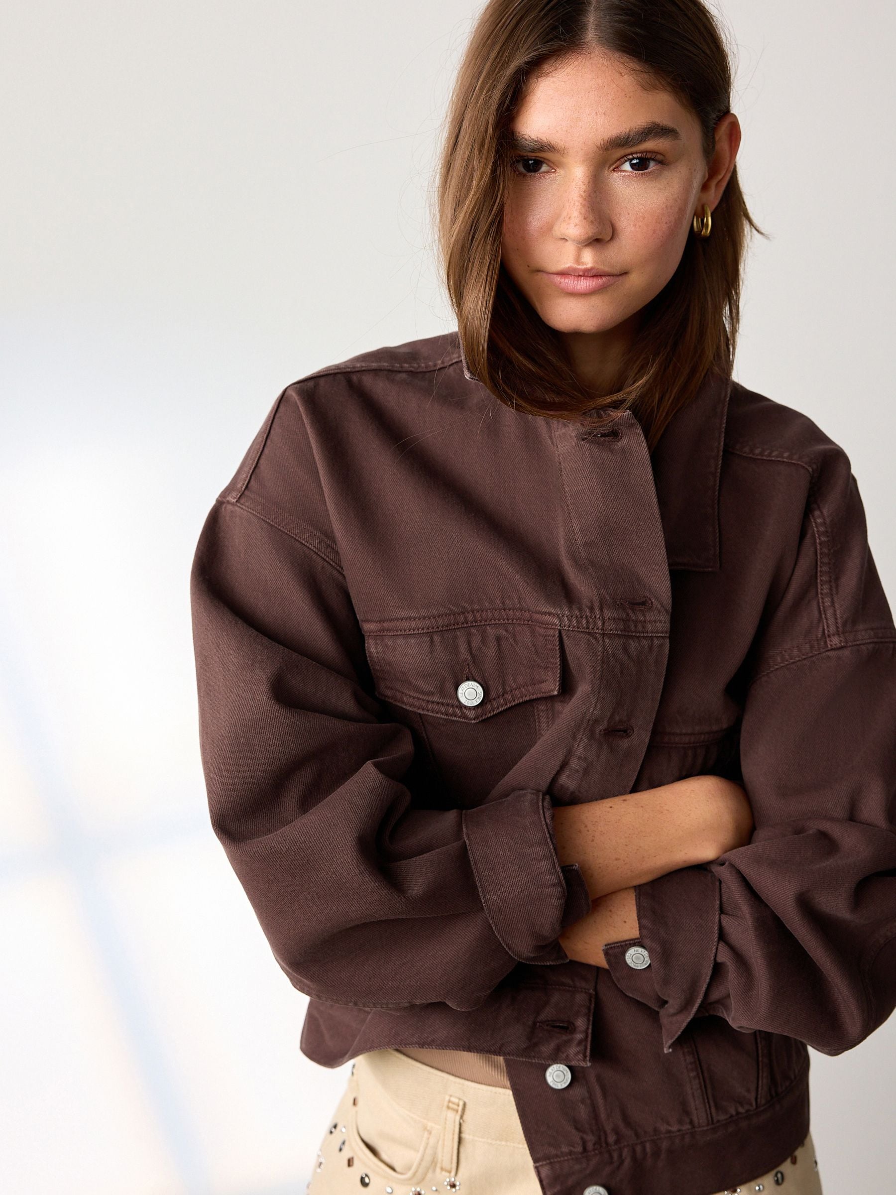 Buy Chocolate Brown Relaxed Denim Trucker Jacket from Next USA