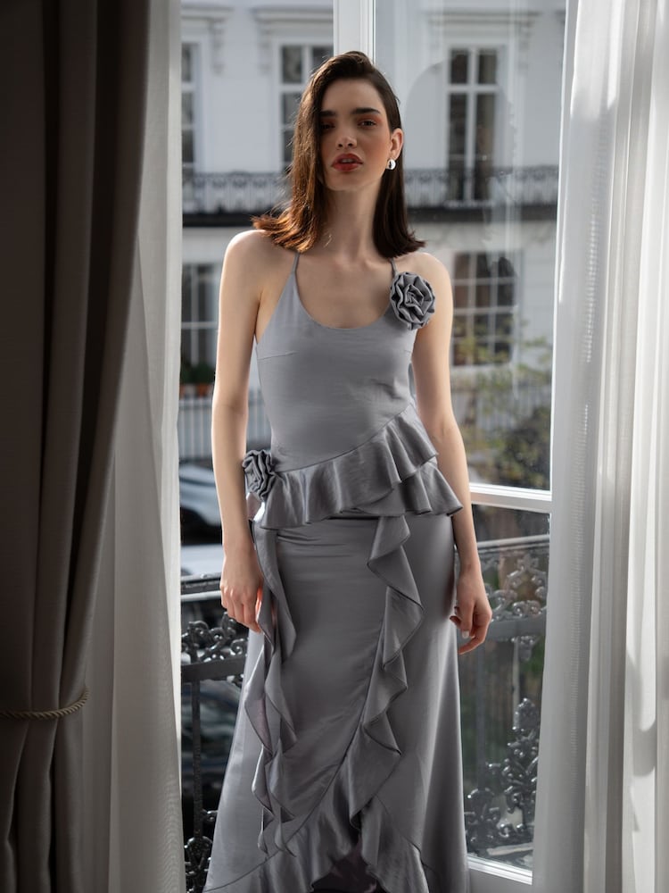Amy Lynn Silver Satin Rose Appliqué Asymmetric Top - Image 1 of 10
